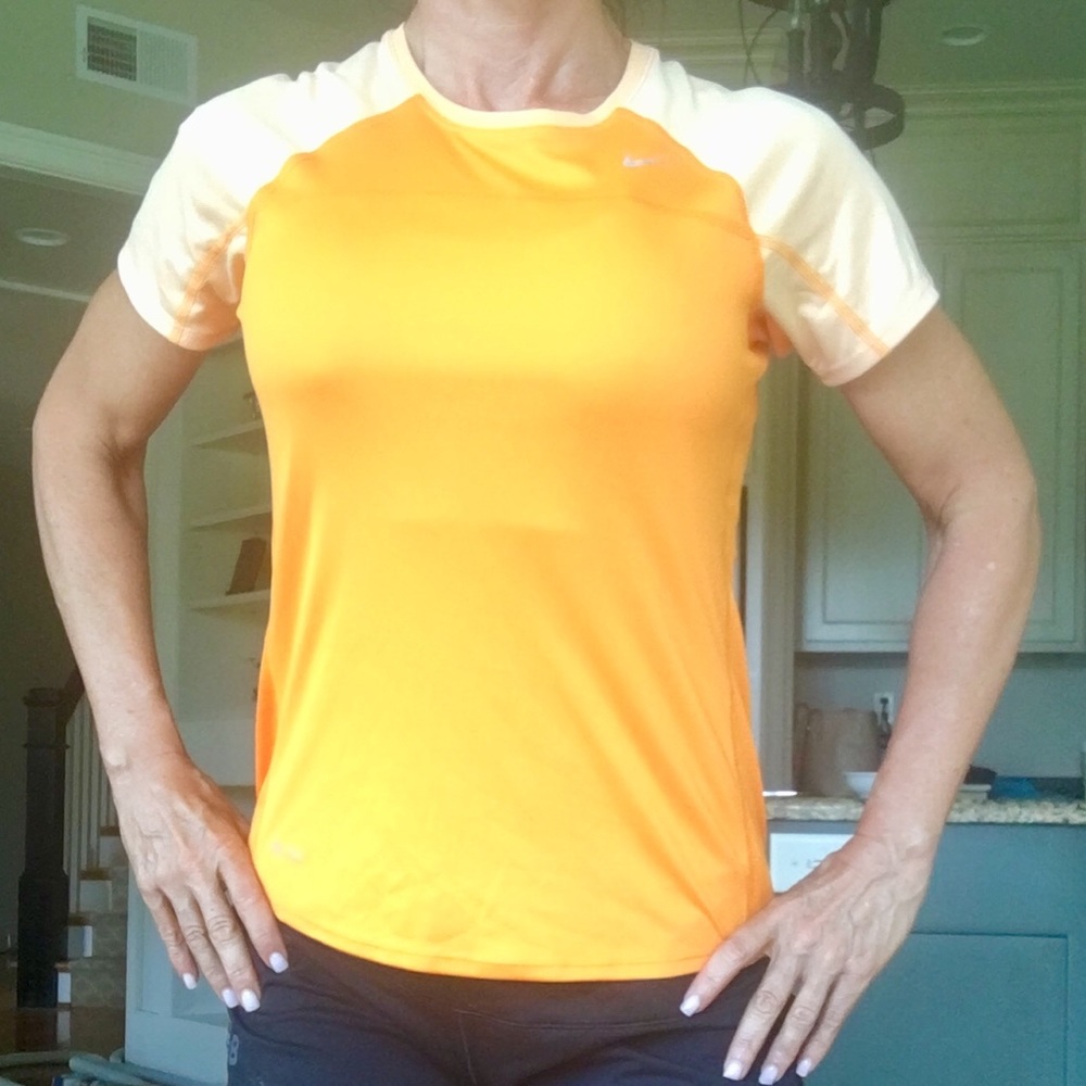 L but fits like Small Orange/coral Nike DriFit Top